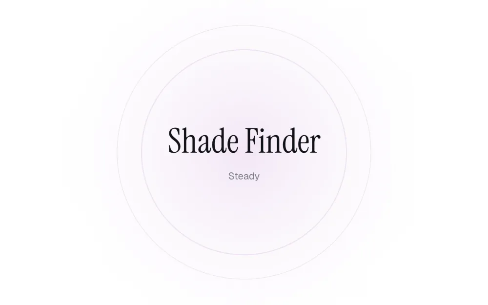 The Shade Finder test before a round: its name in large serif type inside soft purple rings, with the level word Steady underneath